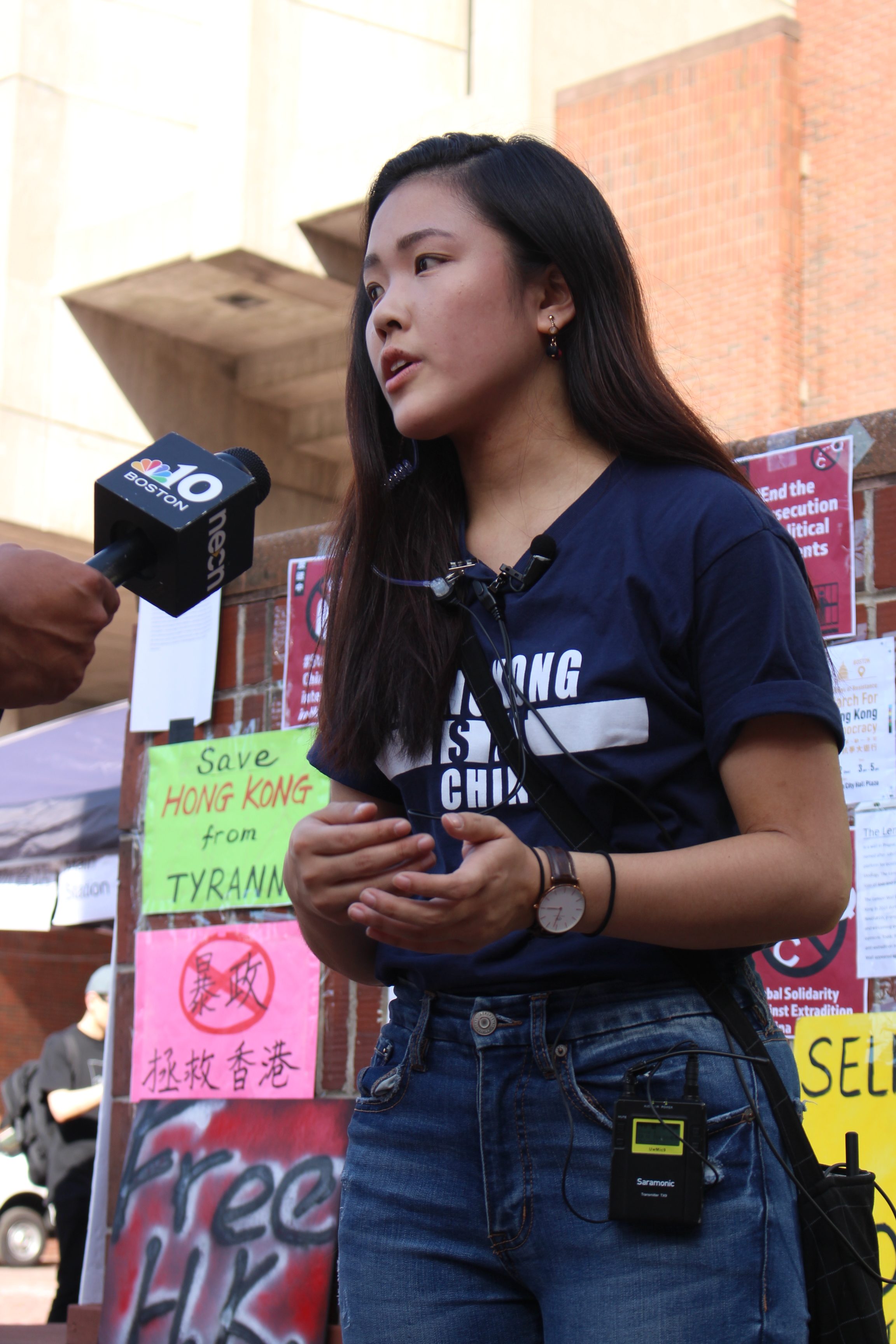 Emerson student and event organizer, Frances Hui, 19, spoke in support of the Hong Kong Human Rights Act currently being debated in Congress. Photo by Lex Weaver.
