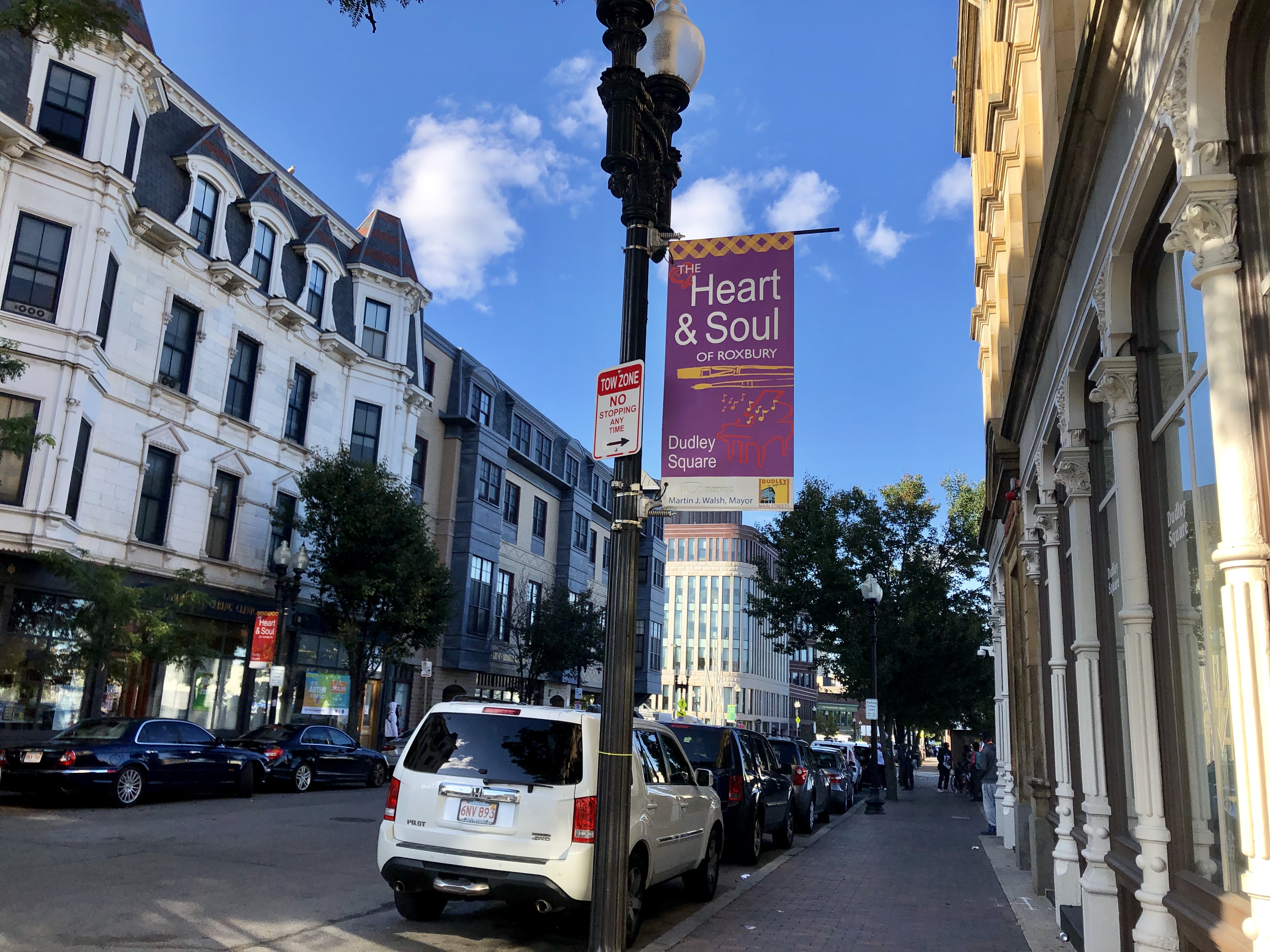 Banners across the streets of Dudley Square pronounce, “Dudley Square: the Heart and Soul of Roxbury.” Photo by Eileen O'Grady.