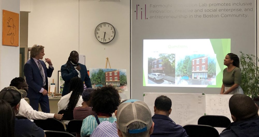 From left: Michael Maloney, Mark Bouquet and Vanessa Jean-Baptiste present their plan for Legal Greens LLC to an audience of Uphams Corner residents on Wednesday night. Photo by Eileen OGrady.