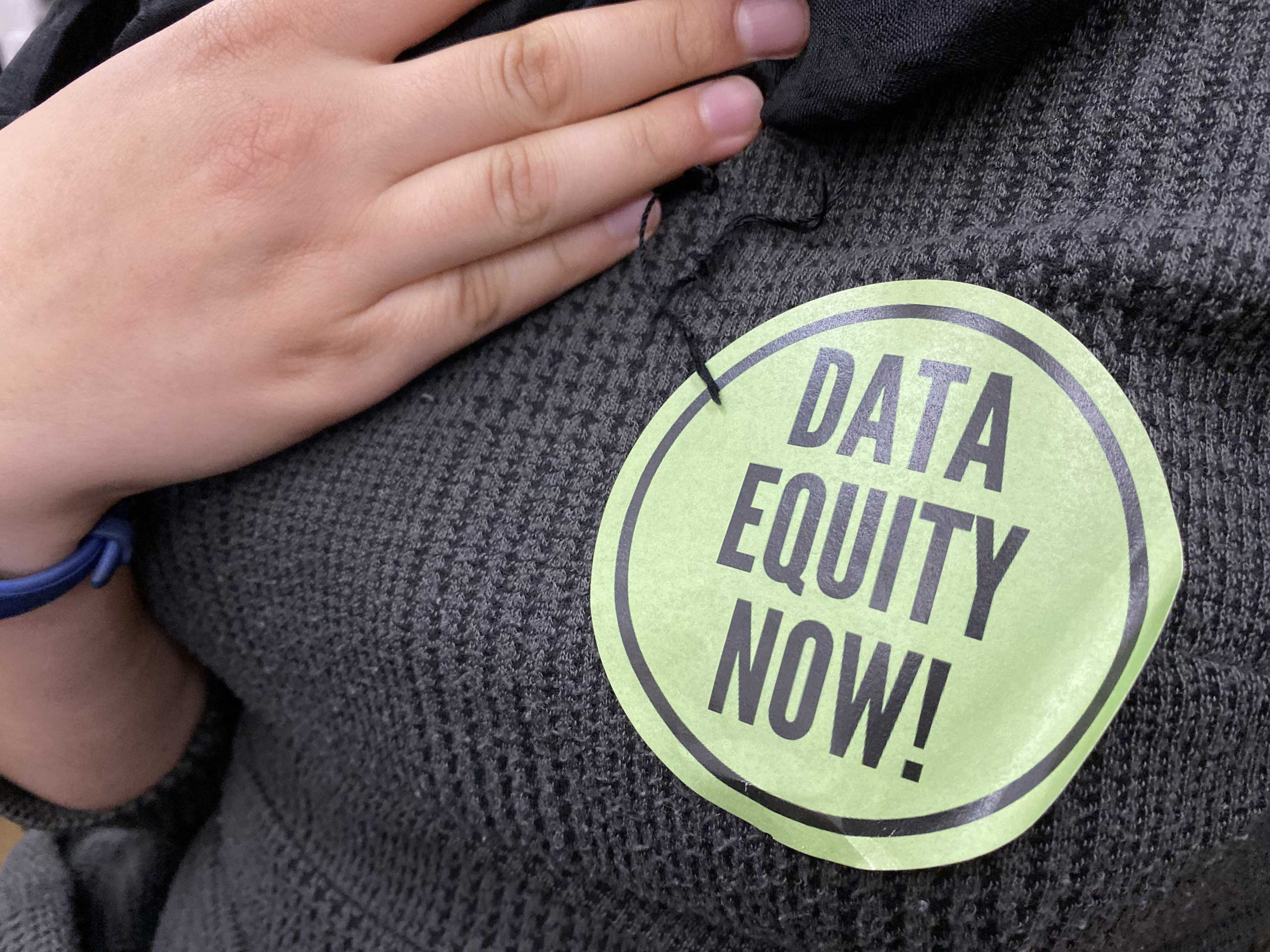 Advocates sporting light green stickers that read “Data Equity Now!” said the bill would give representation to groups within the commonwealth. Photo by Alexa Gagosz.
