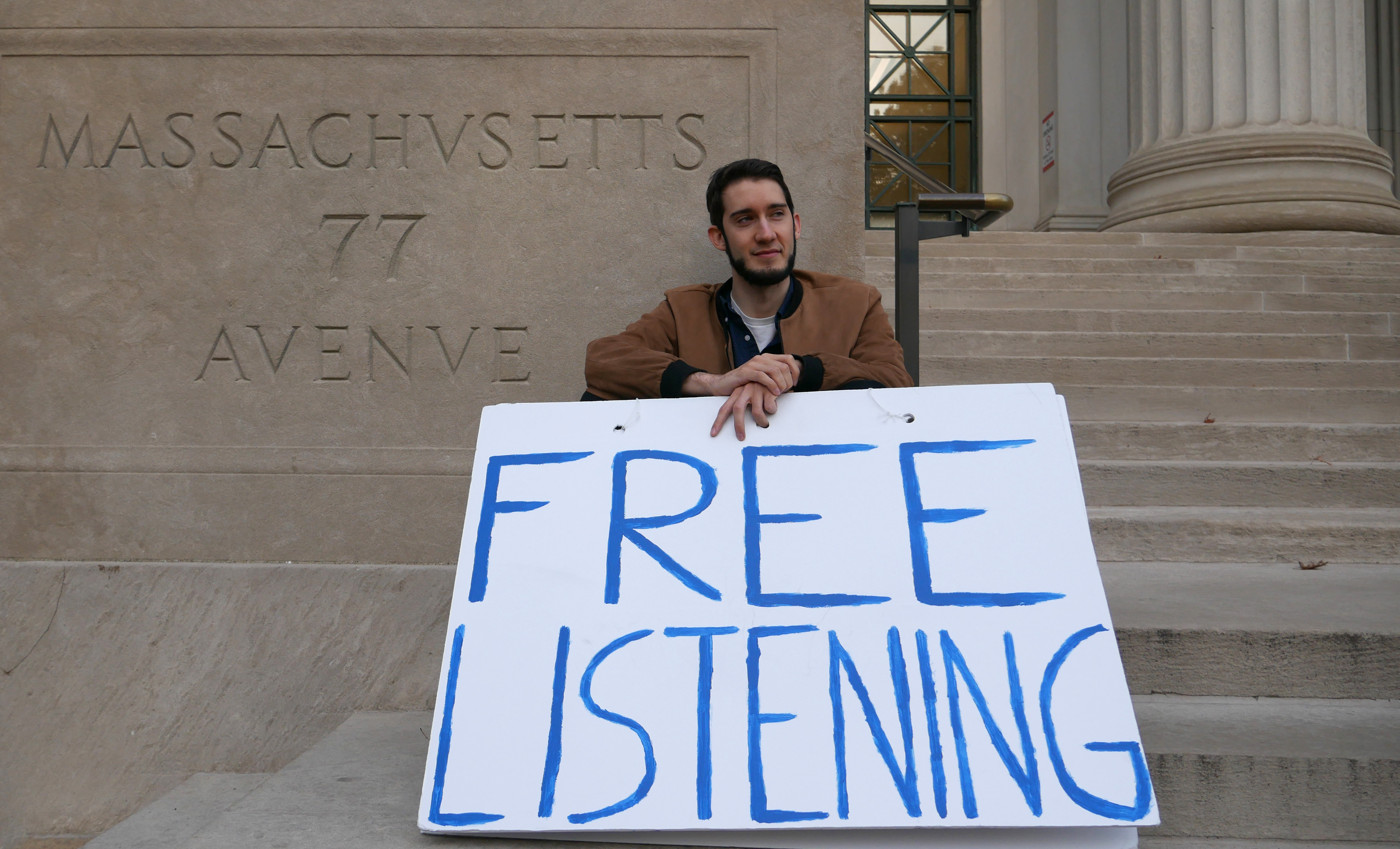 When time and weather permit, Kip Clark sits on the steps of MIT inviting passersby to speak with him. Photo by Jordan Erb.