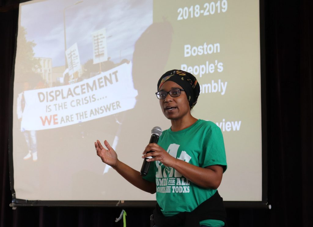 Lisa Owens, executive director of City Life/Vida Urbana spoke at the meeting last week. Photo by Eileen O'Grady.