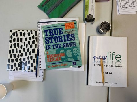 Student textbooks used in the classroom at Nueva Vida Christian Church. Rodríguez hopes to make more English language books available to the Latinx community. Photo by Maria Aguirre Torres.