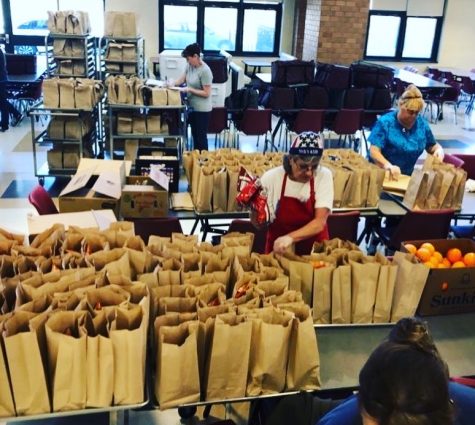 Project Bread volunteers work tirelessly to feed Boston residents facing food shortages during the pandemic.