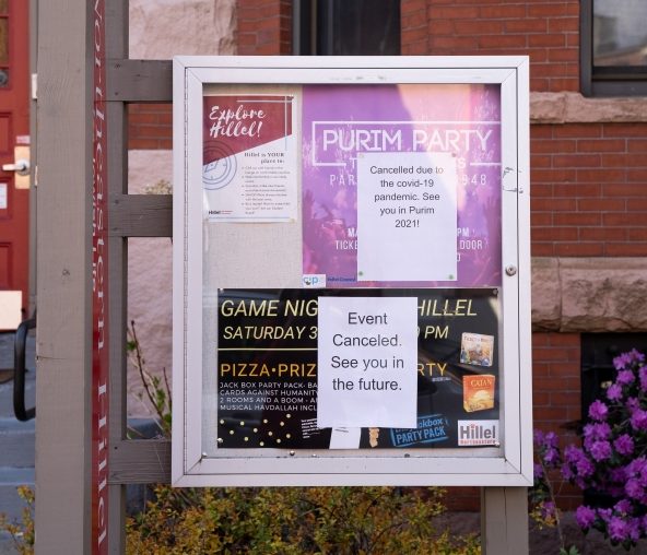 Signs outside the building where Hillel, a Jewish organization on Northeastern University's campus, meet, notifying students of cancelled events.