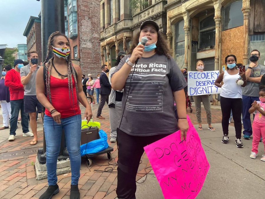 Yahaira Lopez speaking at a protest she organizes with other community members to voice their concerns of the issues against the conditions on Mass/Cass. Photo: Mayra Parrilla Guerrero.