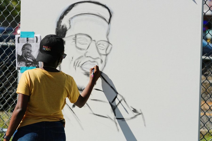 It’s been just about three years since Sophia Dubuisson, a UMass psychology senior, learned about Malcolm X.   “I grew up in Haiti, and my school was honestly mostly European based,” Dubuisson said as she worked on a portrait of Malcolm X on the baseball field at Town Field Park on Saturday. “The most we heard about was MLK.” 