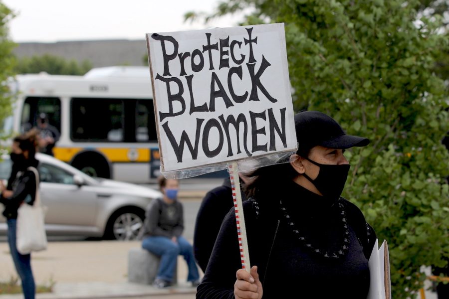 A Protect Black Women sign