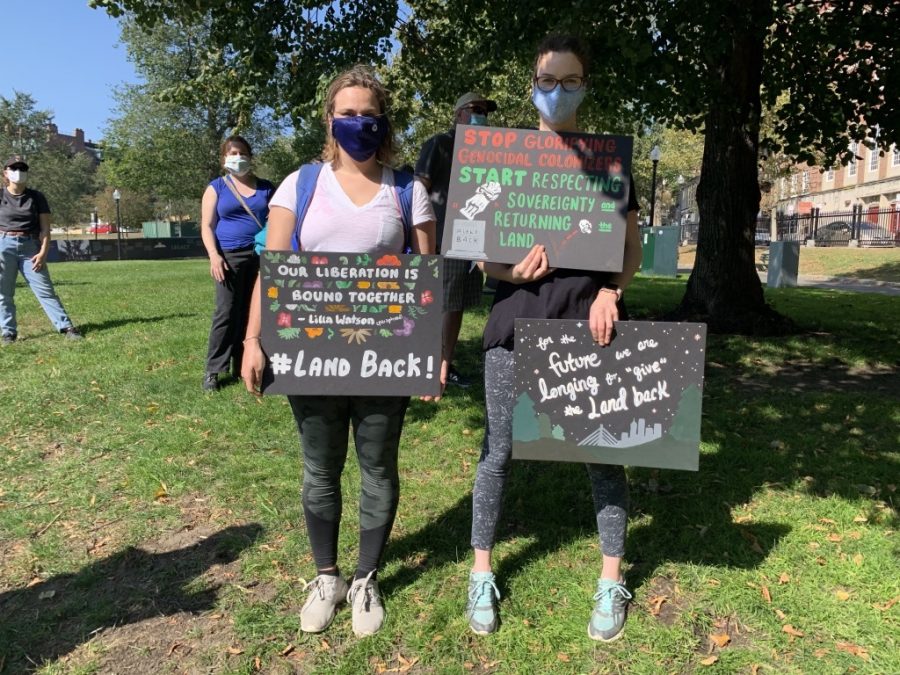 Protesters bringing signs with demands to the rally.