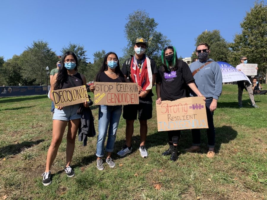 Protesters bringing signs with demands to the rally.