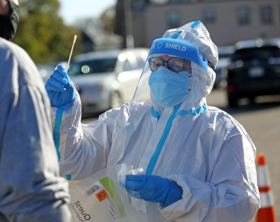 (Mattapan, MA 11/05/20) Melissa Leason administers a COVID-19 test at the Whittier Street Health Center pop-up testing site in the parking lot of the Jubilee Christian Church in Mattapan. (Mayor’s Office Photo by John Wilcox)