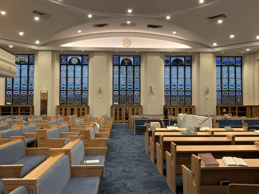 The Kehillath Israel sanctuary from the side entrance, with a view of the stain glass. 