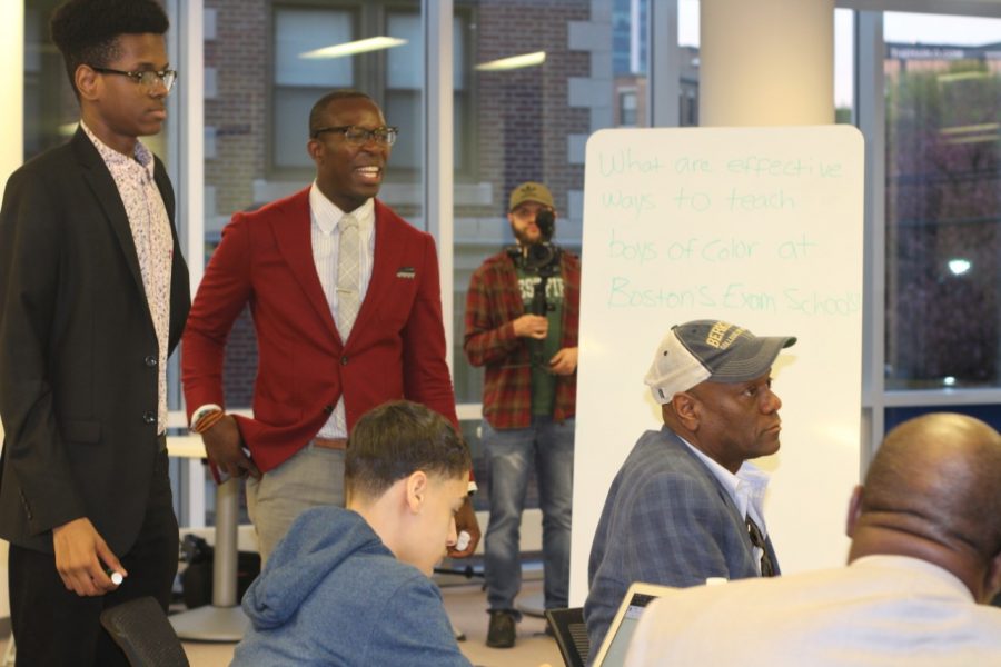 Gavin Smith (second from left) with his mentors and students at a Young Men Organizing for Change meeting