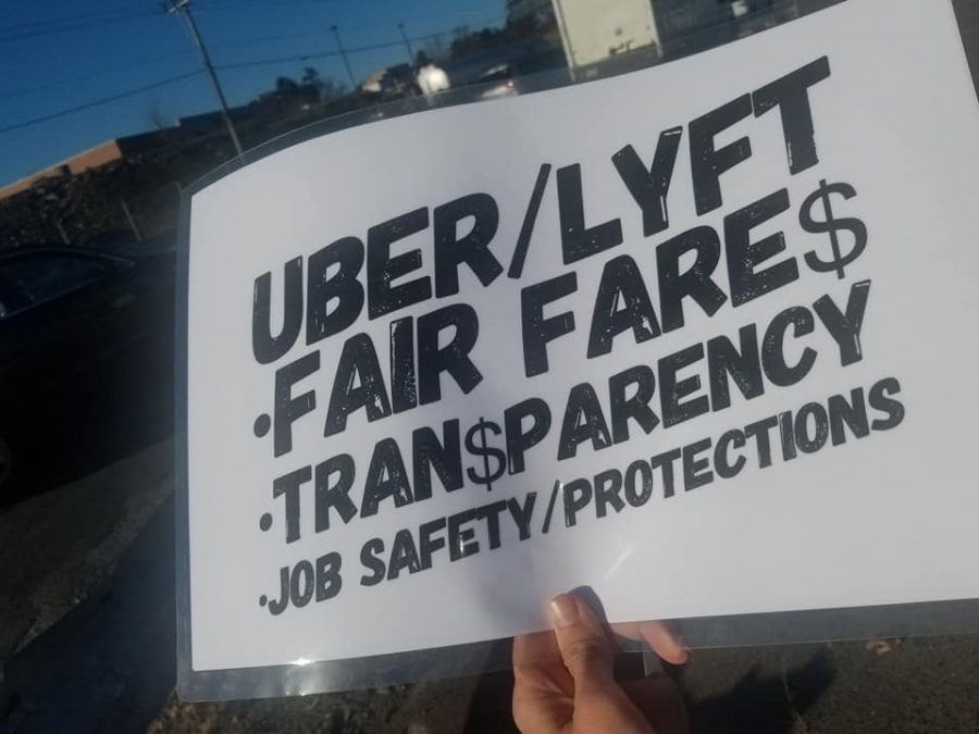 A sign demanding fair fare, transparency, job safety and protection for drivers from Uber and Lyft. Photo taken during March 2019 protest against rideshare companies.