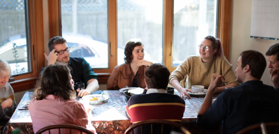 Creche co-founder Isaac Everett (top left) and house residents gather at the Crossing House in North Cambridge.