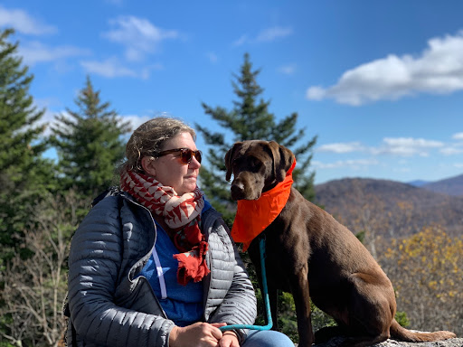 Leader of Friends of JP Dog Parks and JP resident, Melissa Hamel and her dog, Scout.