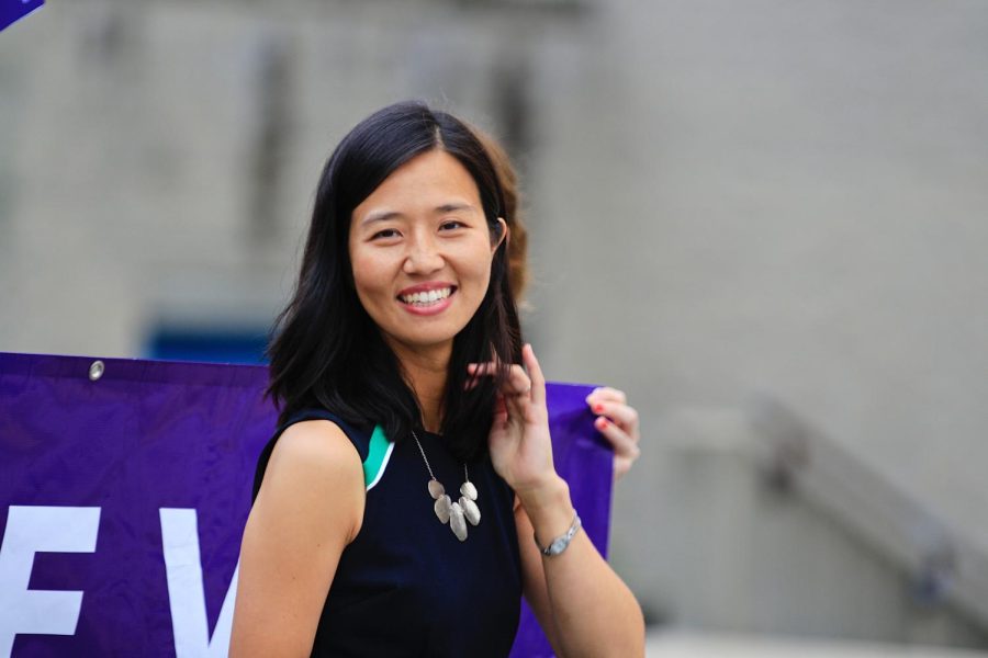 Michelle Wu walks with her campaign team at the Roxbury Unity Day Parade on July 18, 2021.