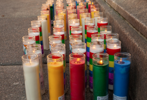 Candles lit by Ryder Summa as part of their tribute to victims of transphobic violence in 2021.