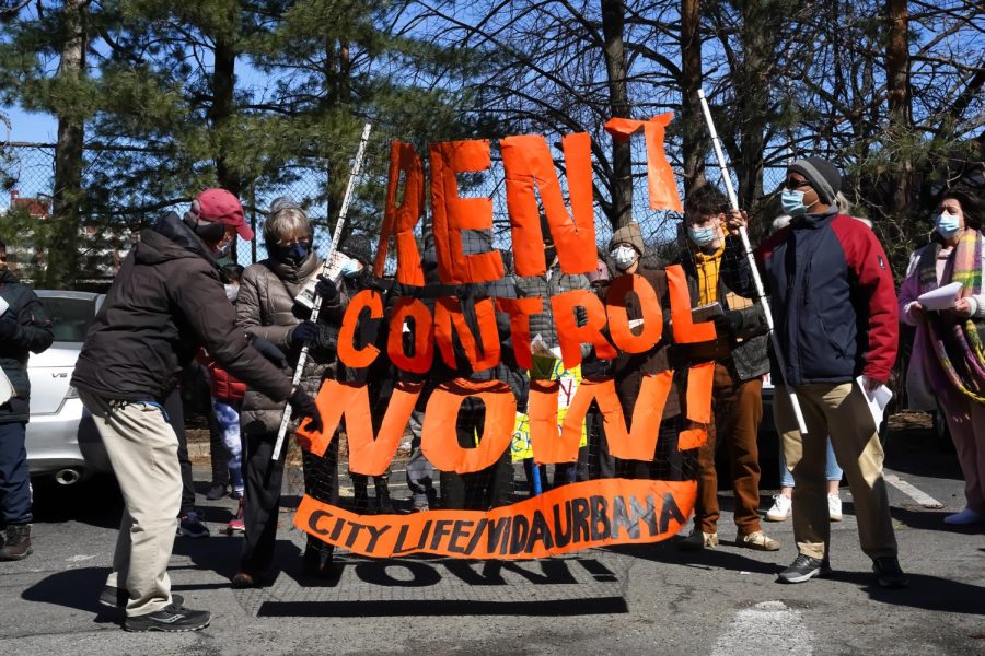 Protesters hold a sign, courtesy of City Life, that demands rent control. In addition to the unhealthy, unclean and undignified living conditions, residents and supporters were also protesting unaffordable rent increases and no-fault evictions.