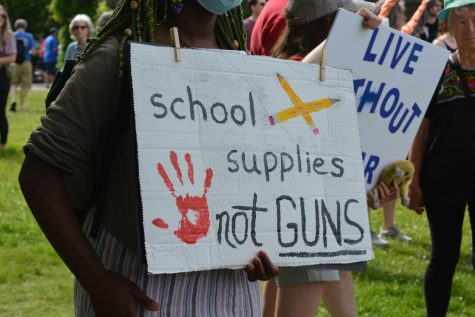 Advocates rally for gun reform at Christopher Columbus Park