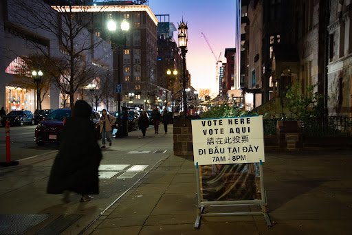Situated on Beacon Street in front of the Old South Church of Boston is a voting sign, indicating the location of the Copley polls for voters in Ward 4 and 5. The statewide midterm elections on Tuesday will determine the next governor as well as lieutenant governor and attorney general, and other state and local positions.