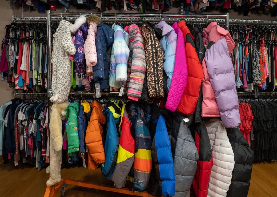 Coats hanging in Caties Closet  distribution center in Dracut, MA. Photo courtesy of Caties Closet. 
