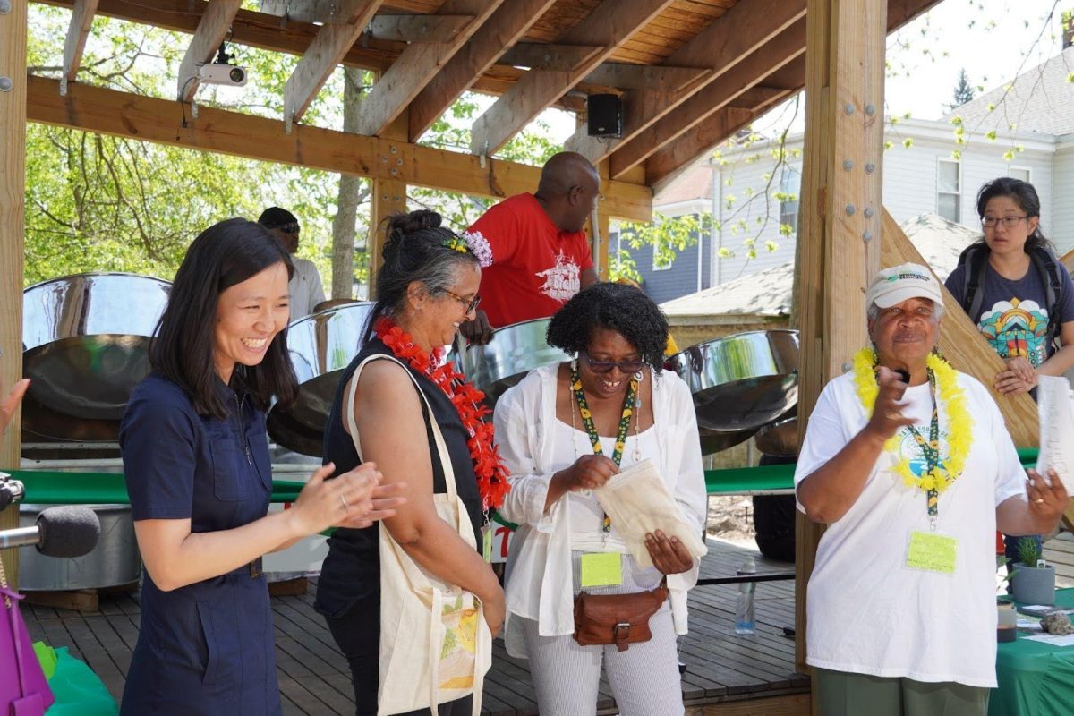 Mayor Michelle Wu greets community members at Boston Food Forest Coalitions Edgewater site. Photo via the Boston Food Forest Coalition