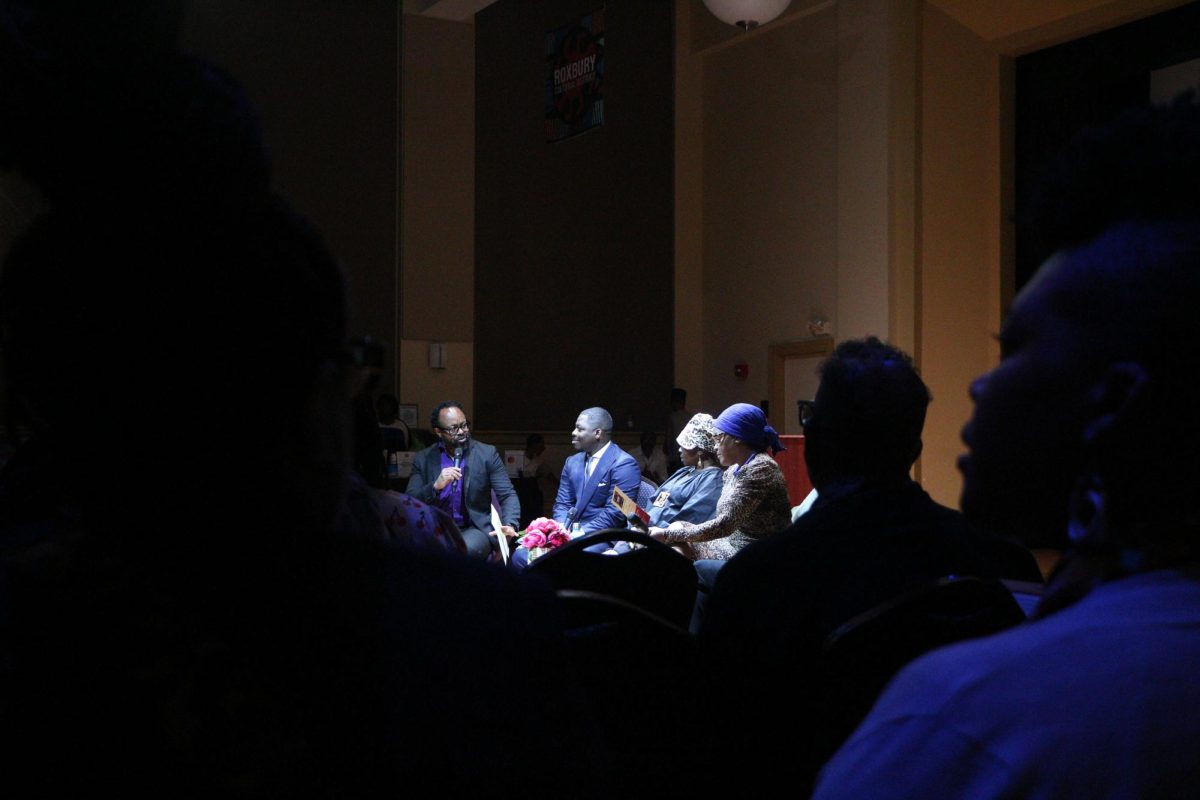 From left to right: Community leaders Lecolian Washington, Rev. Willie Broderick III, Lisa Lee and Kai Grant speak on a panel at Hiberian Hall in Roxbury on Oct. 3, 2024