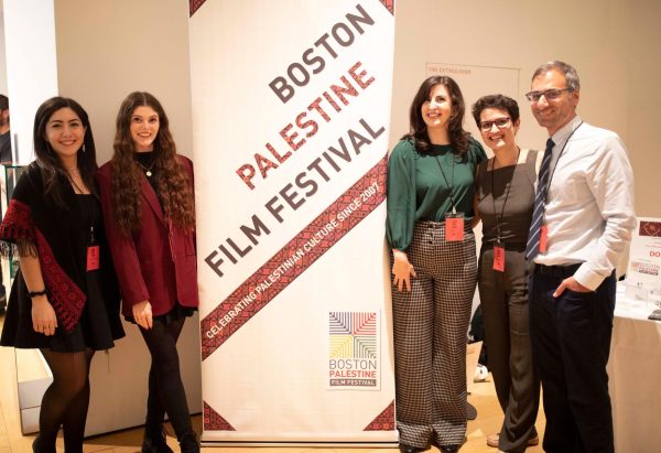 Michael Maria (right) stands with Boston Palestine Film Festival organizers in 2022. Courtesy of Boston Palestine Film Festival.