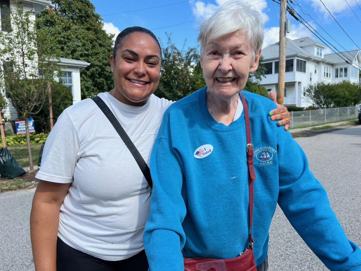 Gissell Melo (left) and Dolores Burton stood side by side after voting in West Roxbury
