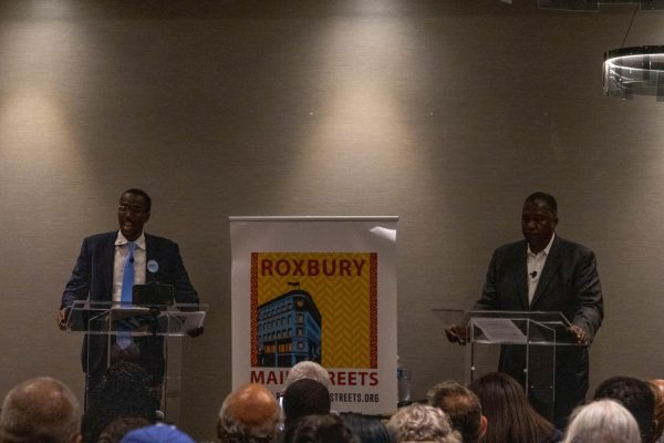 L-R: “Coach” Said Ahmed and Rev. Miniard Culpepper, candidates for Boston’s District 7 city council seat, speak during a debate hosted in Roxbury on Oct. 16.