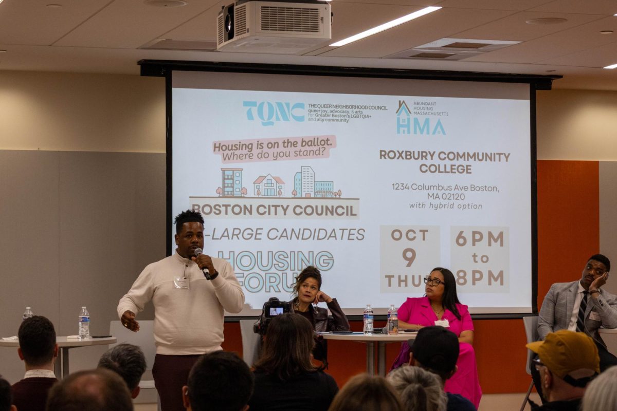 At-large city council candidate, Henry Santana, addresses the audience as he answers a question from the moderator. Santana is running as an incumbent this year, running for reelection after assuming office in 2024. 