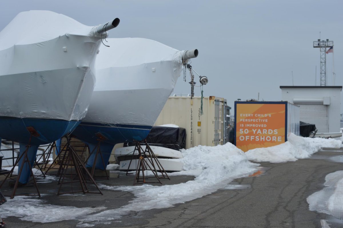 Snow covers boats at Courageous Sailing headquarters in Charlestown.